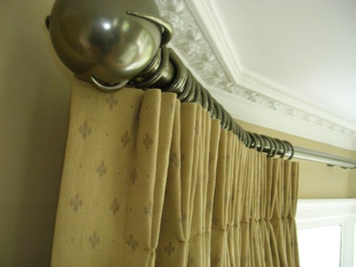 Detail of double pleat heading and finial