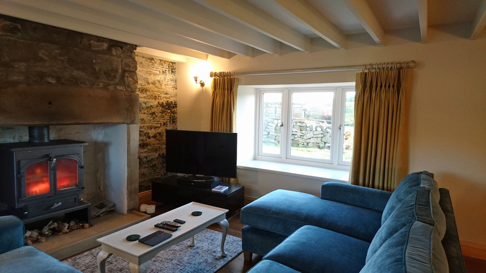 Gold curtains with triple pleats