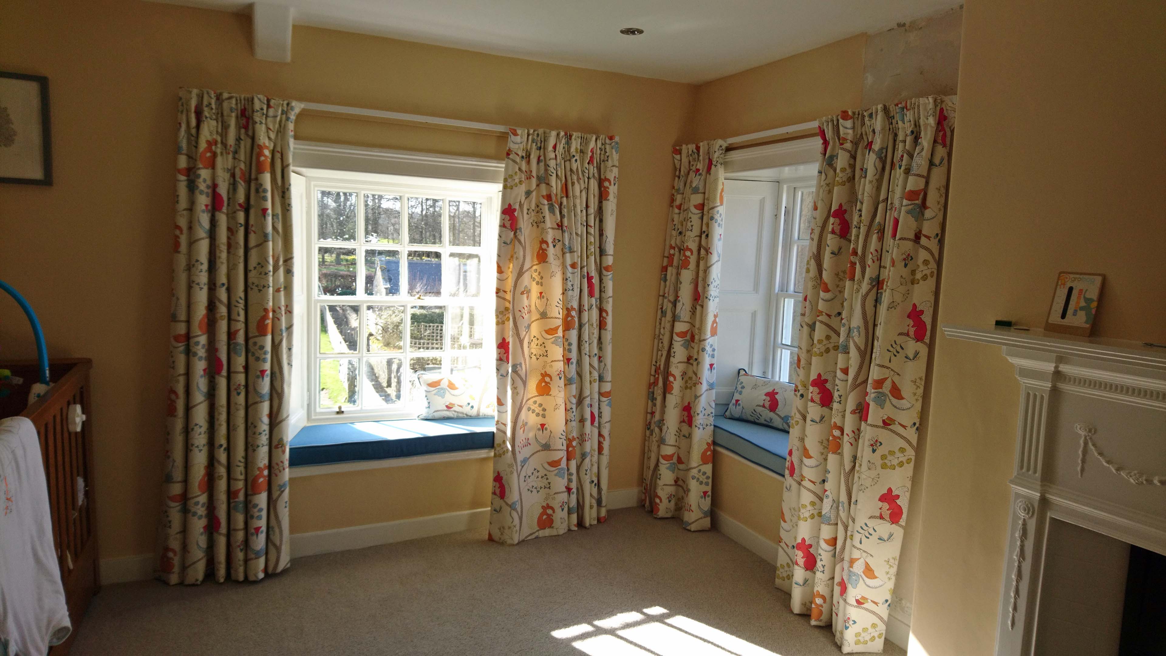 Pencil pleat curtains and window seats