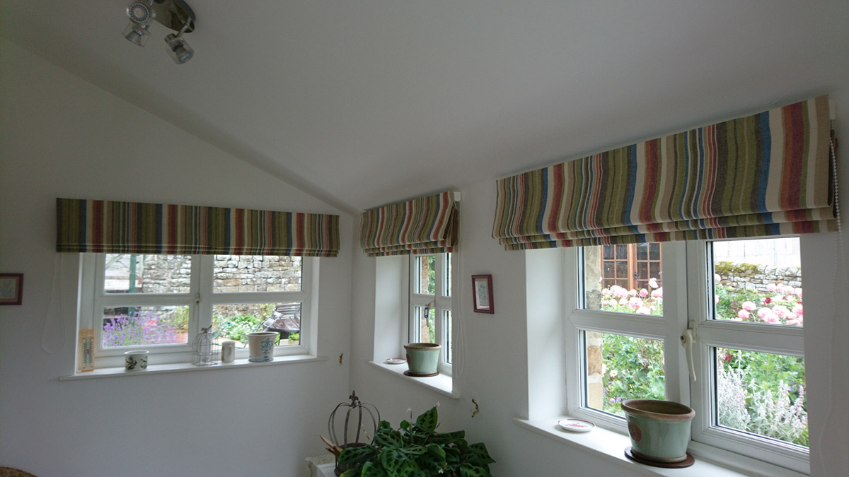 Striped roman blinds
