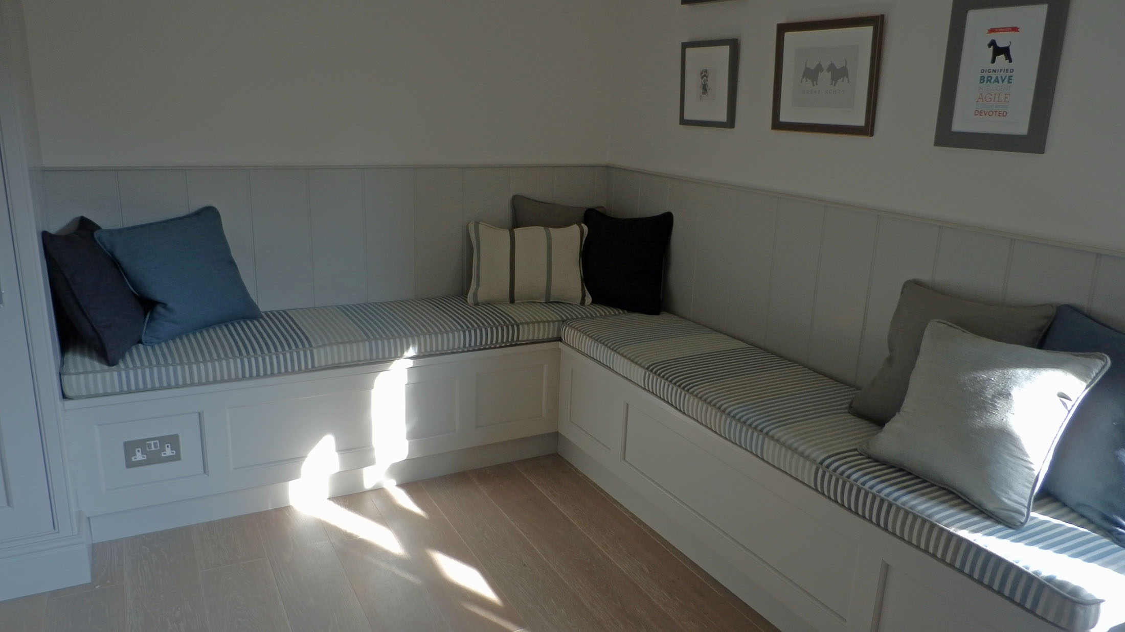 Stripy bench seat cushions and scatter cushions